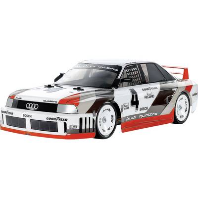 Un modèle détaillé d'une voiture de course blanche portant le numéro '4' et arborant les logos d'Audi, Bosch et Goodyear, avec un aileron arrière et un design élégant.