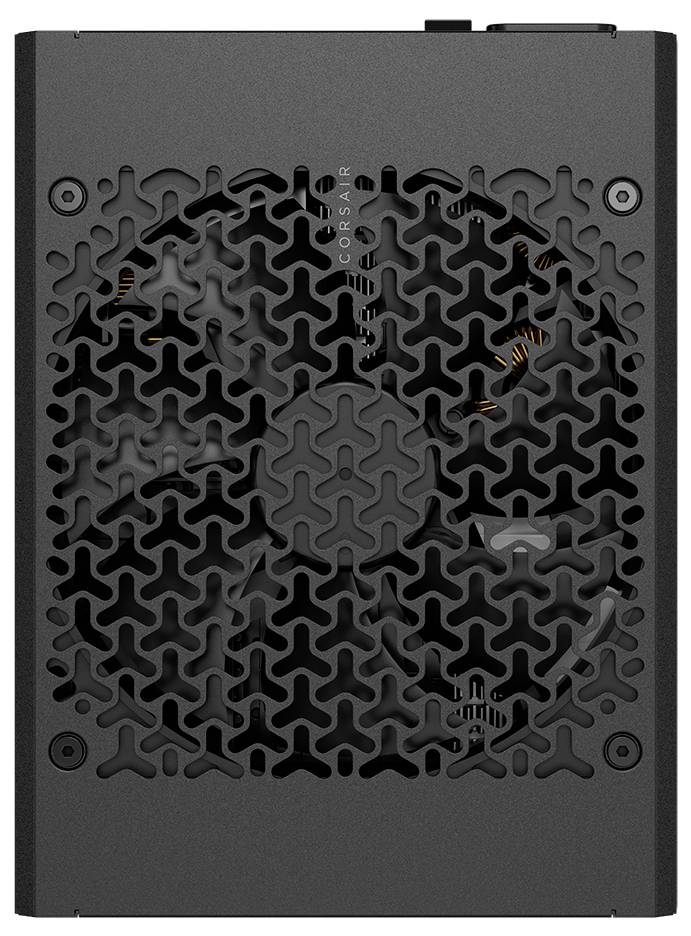 Vue de dessus d'une alimentation de la série Corsair RMx montrant un grand ventilateur à travers une grille ajourée au motif distinctif pour le refroidissement.