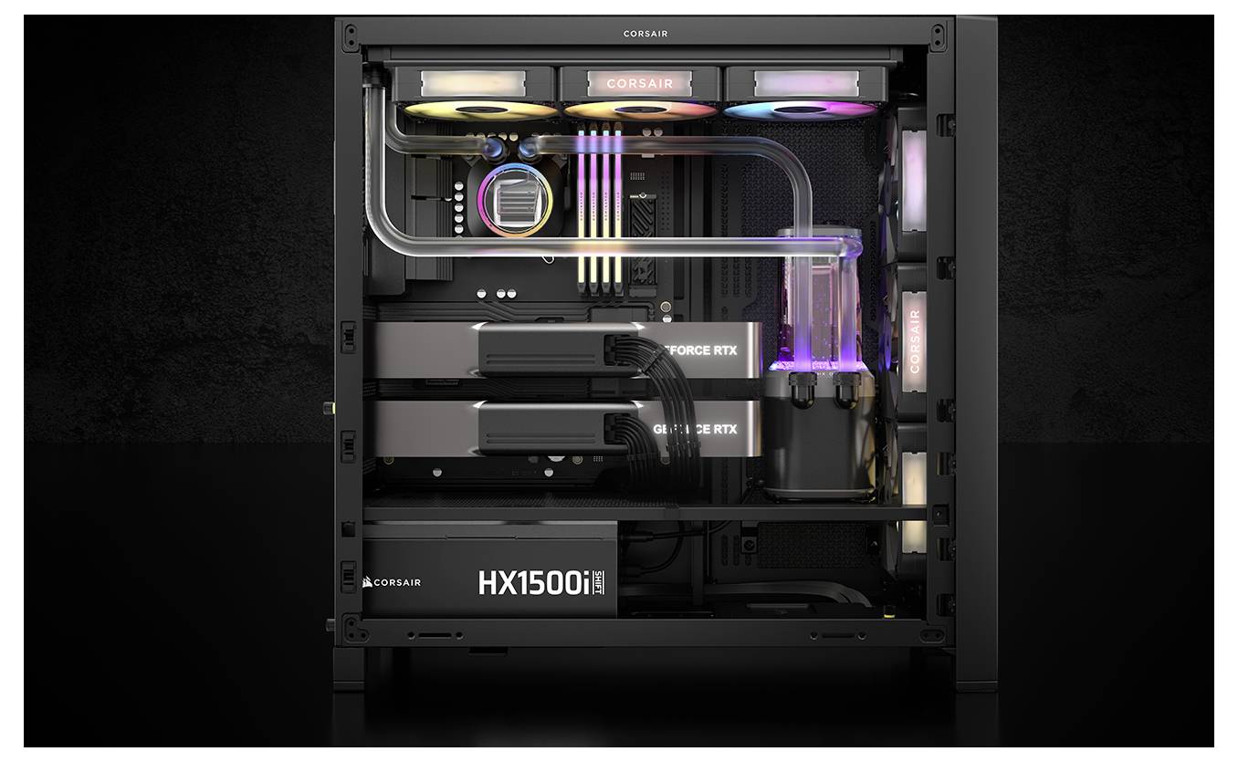 PC de jeu avec un boîtier transparent révélant deux cartes graphiques, des ventilateurs de refroidissement RGB, un système de refroidissement liquide et une alimentation 'HX1500i'.