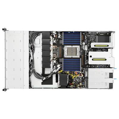 L'image montre l'intérieur d'un boîtier serveur avec des câbles soigneusement organisés, des alimentations électriques doubles et des dissipateurs thermiques bleus au-dessus des emplacements de RAM.