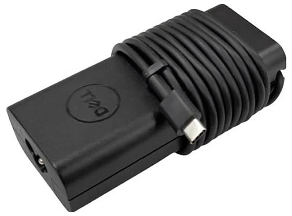 Un adaptateur d'alimentation noir pour ordinateur portable avec un câble enroulé attaché.