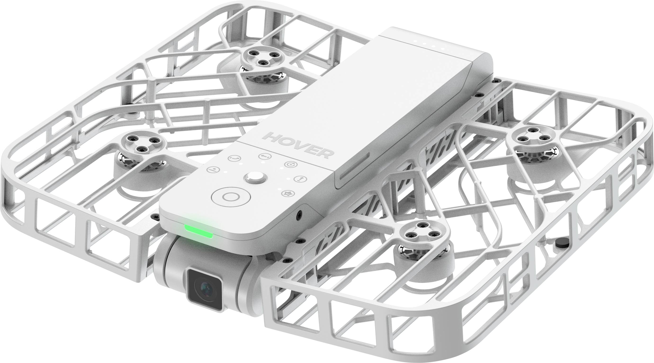 Un drone compact, blanc, avec un boîtier de protection et quatre rotors. Il possède une petite caméra à l'avant et est marqué du mot « HOVER ».