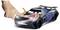 Une main appuie sur le capot d'une voiture de course miniature, la faisant s'illuminer et émettre un son de « VROOOOM ! », illustrant une fonctionnalité interactive.