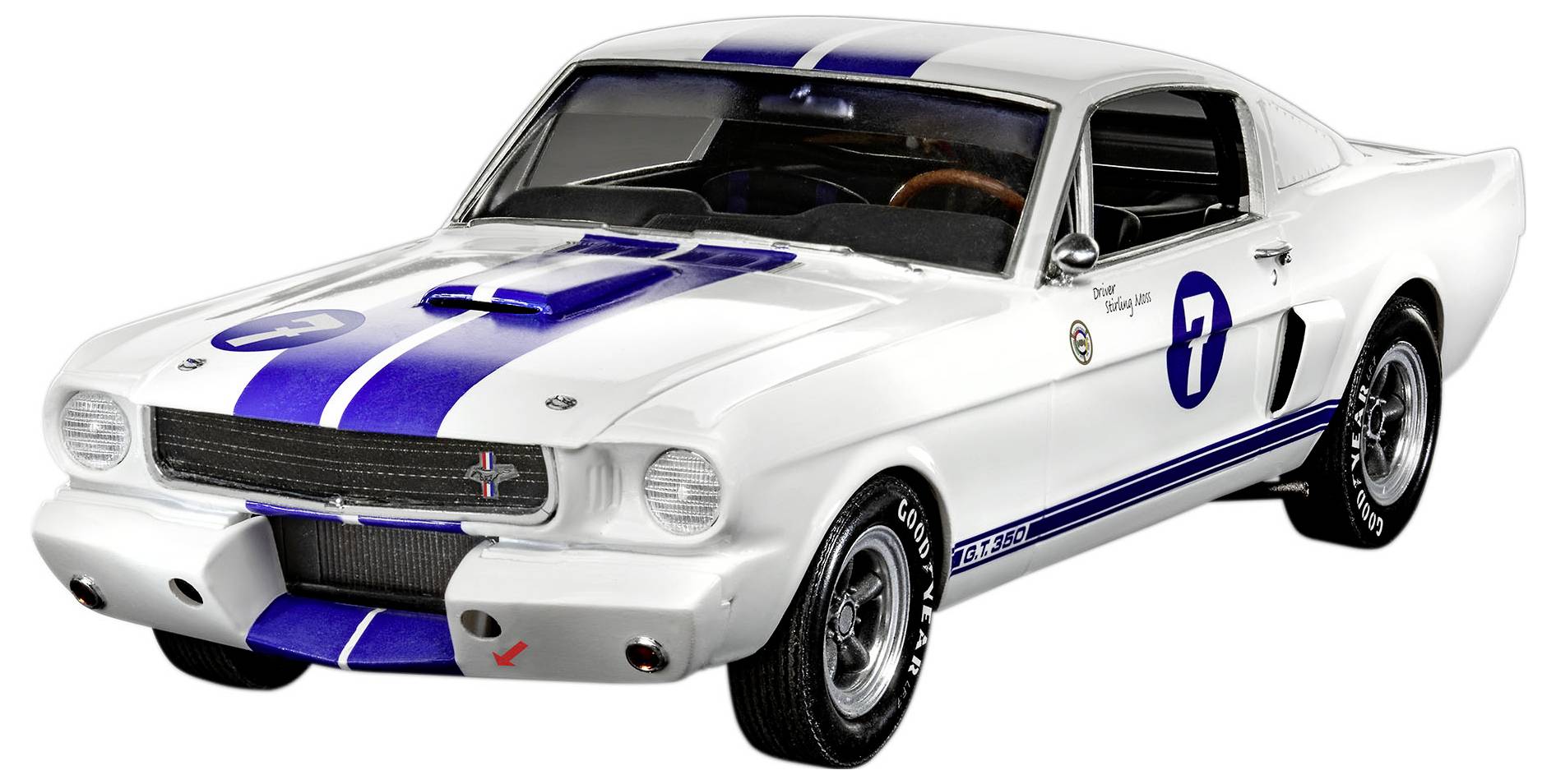 Une voiture de collection blanche avec des bandes bleues de course et le numéro '7' sur le côté, présentant un design vintage et une apparence sportive.
