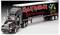 Un camion noir portant l'inscription 'Iron Maiden' et 'Run for Your Lives World Tour 2025-26' sur sa remorque, avec des graphiques de tournée sur le côté.