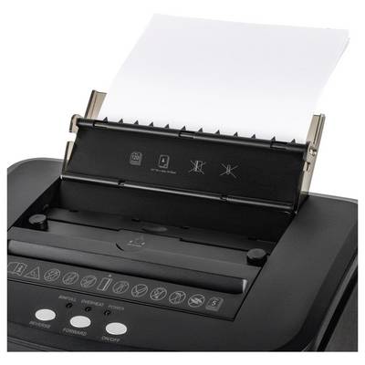 Gros plan sur un destructeur de documents noir avec une pile de papier blanc en cours de déchiquetage. Différentes icônes indiquent les fonctions et les caractéristiques du destructeur.