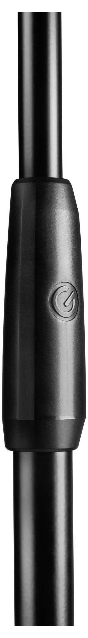 Un gros plan d'une tige en métal noir avec une poignée cylindrique lisse présentant un logo gravé.