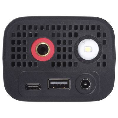 'Gros plan d'un appareil électronique montrant un port USB-C, un port USB-A, une prise d'alimentation et un capteur sous une surface perforée.'