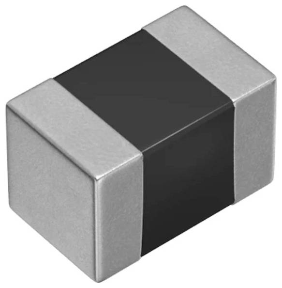 Un petit composant électronique rectangulaire avec un noyau noir et des extrémités métalliques, probablement une résistance ou un condensateur CMS, utilisé en électronique.