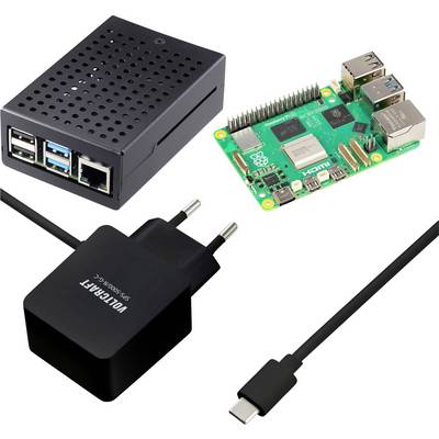 Composants du kit de démarrage Raspberry Pi : carte Raspberry Pi, boîtier noir ventilé, adaptateur secteur USB, et câble USB-C.
