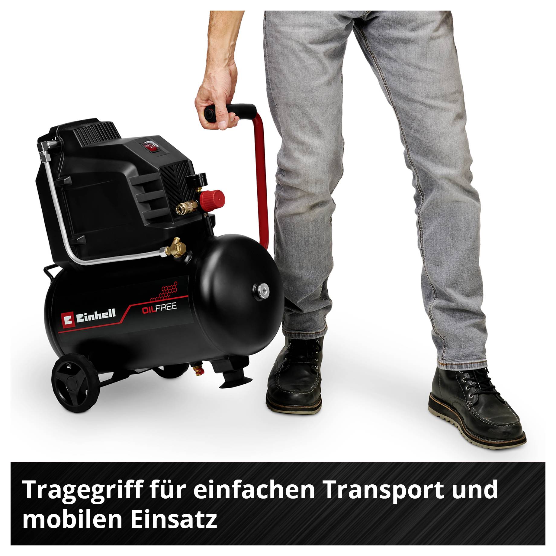 Une personne tient un compresseur portable noir Einhell par la poignée ; en bas est écrit : « Poignée de transport pour un transport facile et une utilisation mobile ».