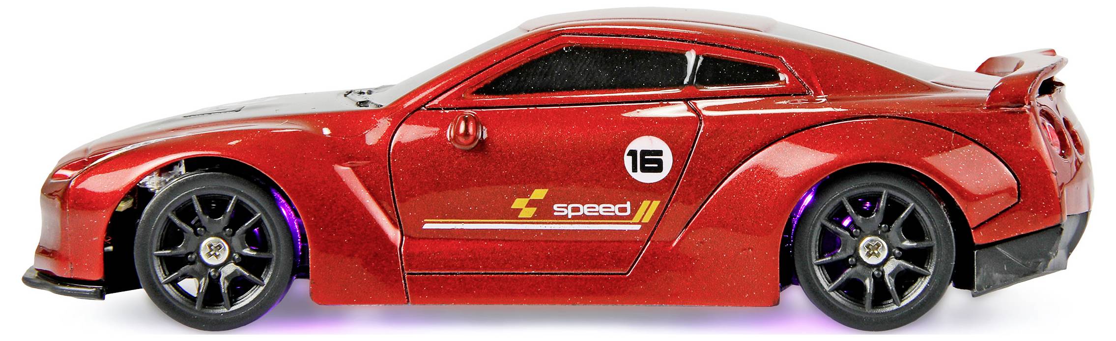 Une voiture de course miniature rouge avec des roues noires, portant le numéro '16' et un graphique 'speed' sur le côté, positionnée sur un fond blanc.