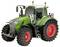 Un tracteur vert et rouge avec de grandes roues, adapté aux travaux agricoles, est présenté sous un angle de trois quarts avant.