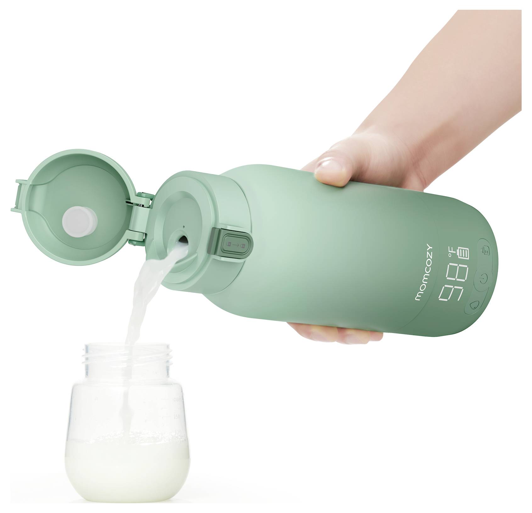 Une main versant du lait d'un thermos vert dans un biberon. Le thermos affiche '98°F' indiquant la température.