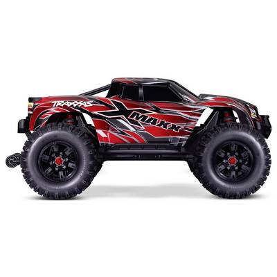 Un camion monstre télécommandé rouge et noir avec de grandes roues tout-terrain, portant le nom de marque 'TRAXXAS' et le modèle 'X-MAXX' sur le côté.