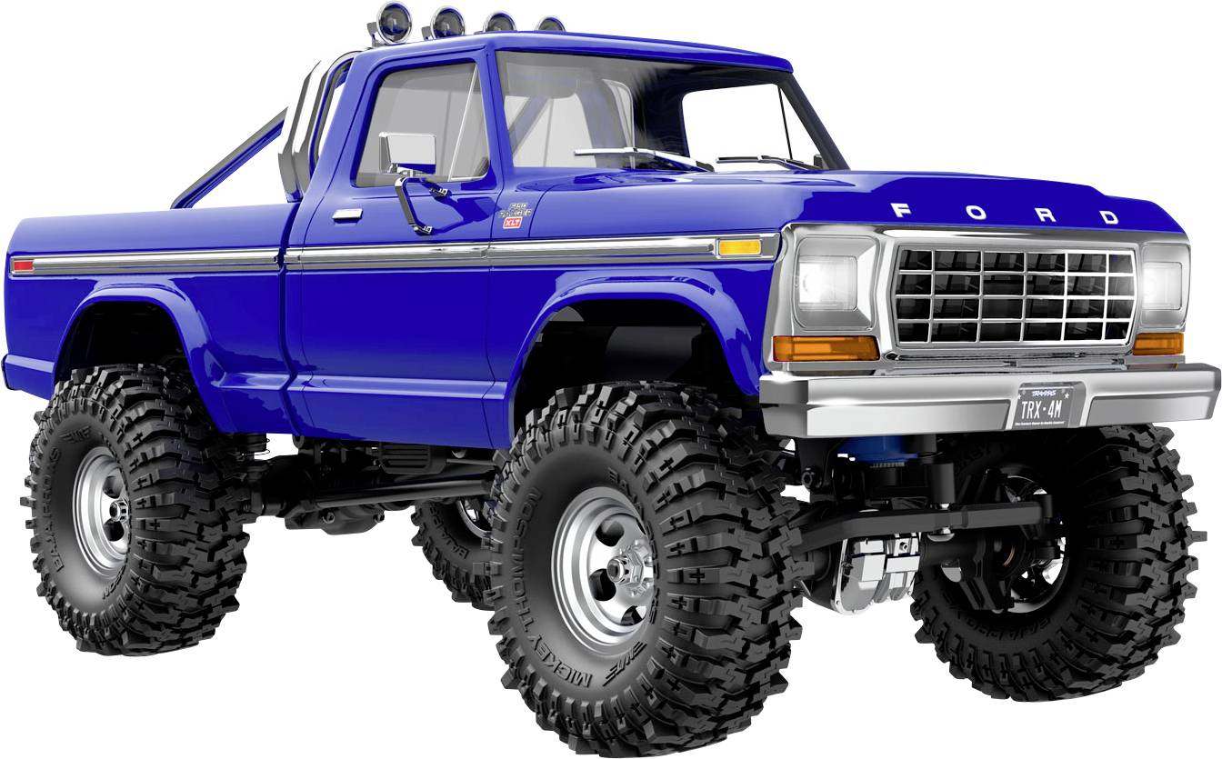 Un camion Ford vintage bleu avec de grands pneus tout-terrain et un arceau de sécurité est présenté en angle, mettant en valeur son design robuste.