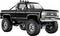 Un camion Chevrolet noir surélevé présente des pneus surdimensionnés et des détails chromés, mettant en valeur ses capacités tout-terrain robustes.