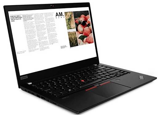 Un ordinateur portable noir affichant une mise en page de magazine sur l'écran avec du texte et des images de fruits ; le clavier comprend un stick de pointage rouge.