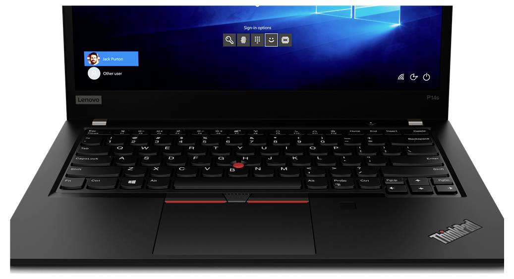 Un ordinateur portable Lenovo ThinkPad affichant un écran de connexion avec des options utilisateur. Le clavier et une partie de l'écran montrant les détails de connexion sont visibles.
