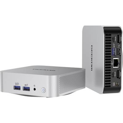 Petit PC GEEKOM compact de couleur argent montré de face et de côté. L'avant dispose de ports USB et d'un bouton d'alimentation ; le côté affiche davantage de ports pour la connectivité.