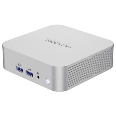 Un mini PC compact de couleur argent avec le logo "GEEKOM" sur le dessus, doté de deux ports USB, d'une prise casque et d'un bouton d'alimentation à l'avant.