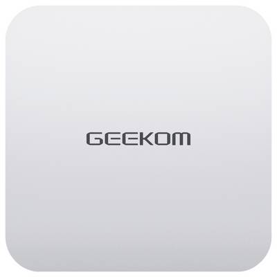Une surface carrée et blanche avec le mot « GEEKOM » centré en lettres majuscules noires.