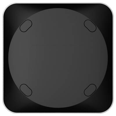 Vue aérienne d'un dessous de verre en caoutchouc noir de forme carrée avec des coins arrondis et des enfoncements circulaires aux coins.