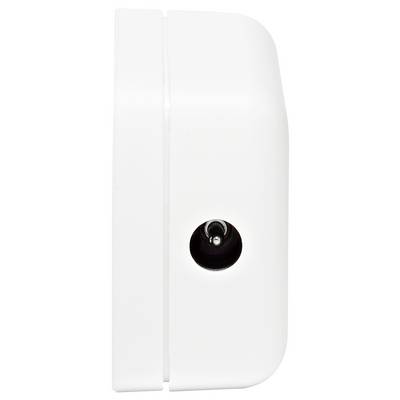 Un gros plan d'un appareil blanc monté sur un mur, probablement un capteur ou un bouton, avec un petit objectif ou bouton circulaire sombre sur son côté.