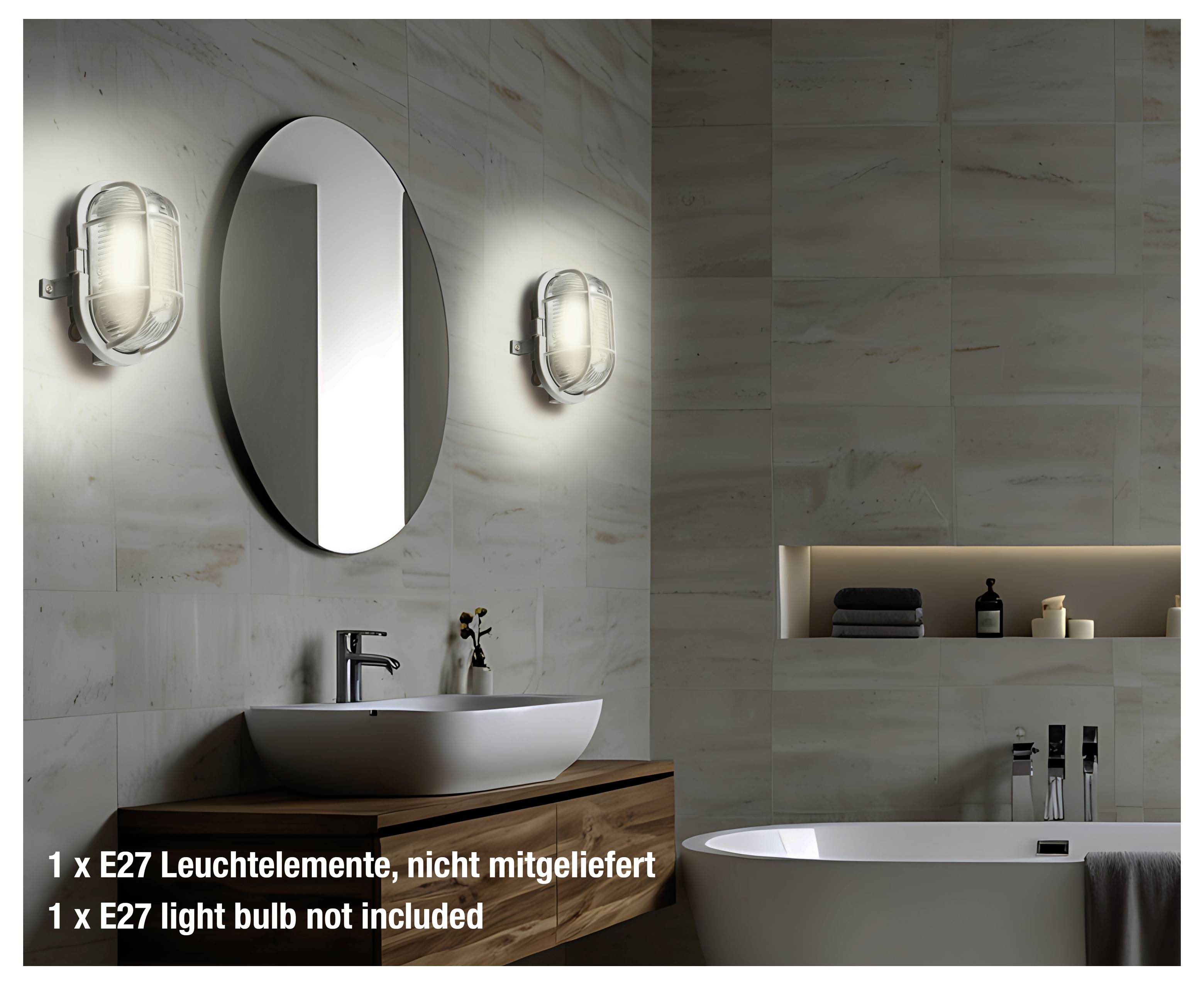 Intérieur de salle de bains avec un lavabo moderne sous un miroir ovale, éclairé par deux appliques murales. Une baignoire est au premier plan. Le texte indique « 1 ampoule E27 non incluse ».