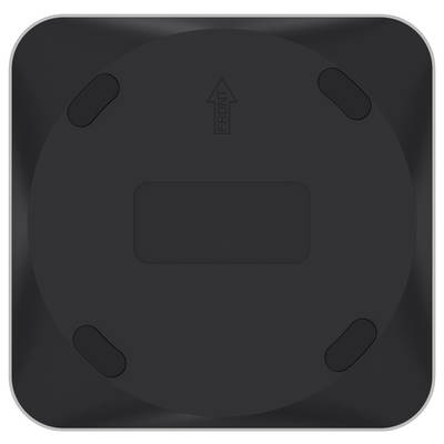 Un pad noir, carré avec des coins arrondis et un élément circulaire central comportant quatre petits pads. Une flèche indique 'avant' sur la face supérieure.