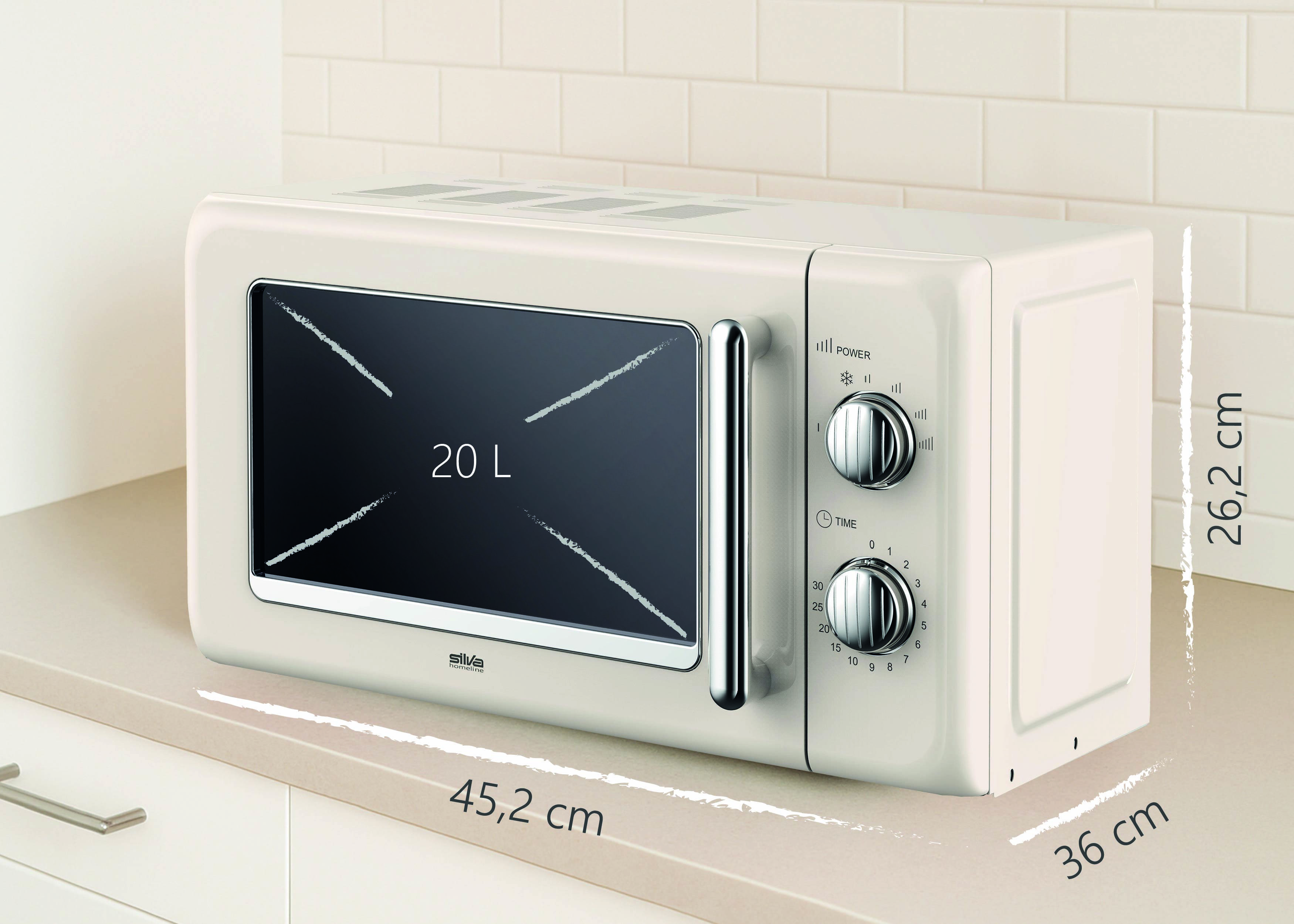 Un four à micro-ondes blanc sur un plan de travail, affichant les dimensions suivantes : 45,2 cm de large, 26,2 cm de hauteur, 36 cm de profondeur, avec une capacité de 20 litres.