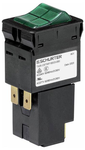 Un interrupteur à bascule rectangulaire vert illuminé, portant des spécifications électriques pour une utilisation en AC240V et AC277V.