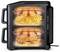 Un air fryer noir avec deux compartiments montrant des images en coupe : en haut des frites, en bas un poulet rôti, illustrant le processus de cuisson.