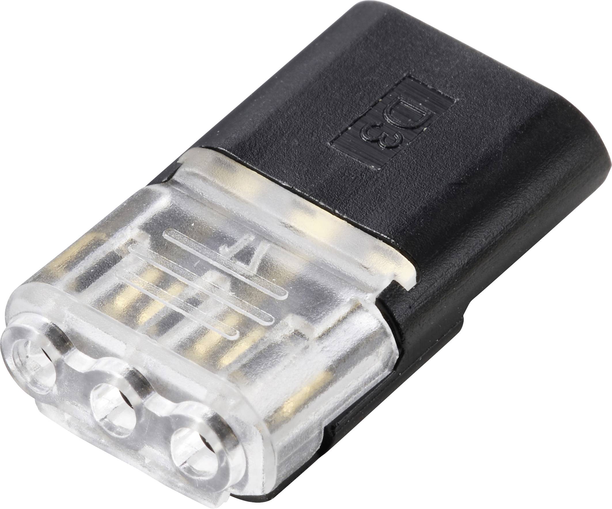 Une image en gros plan d'un adaptateur de prise électrique noir et transparent avec des connecteurs métalliques visibles à une extrémité.