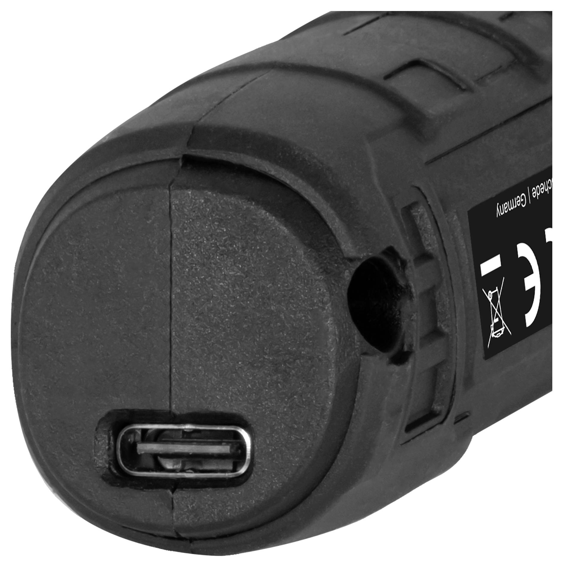 Gros plan d'un appareil électronique cylindrique noir avec un port USB-C et une étiquette de certification CE partiellement visible.