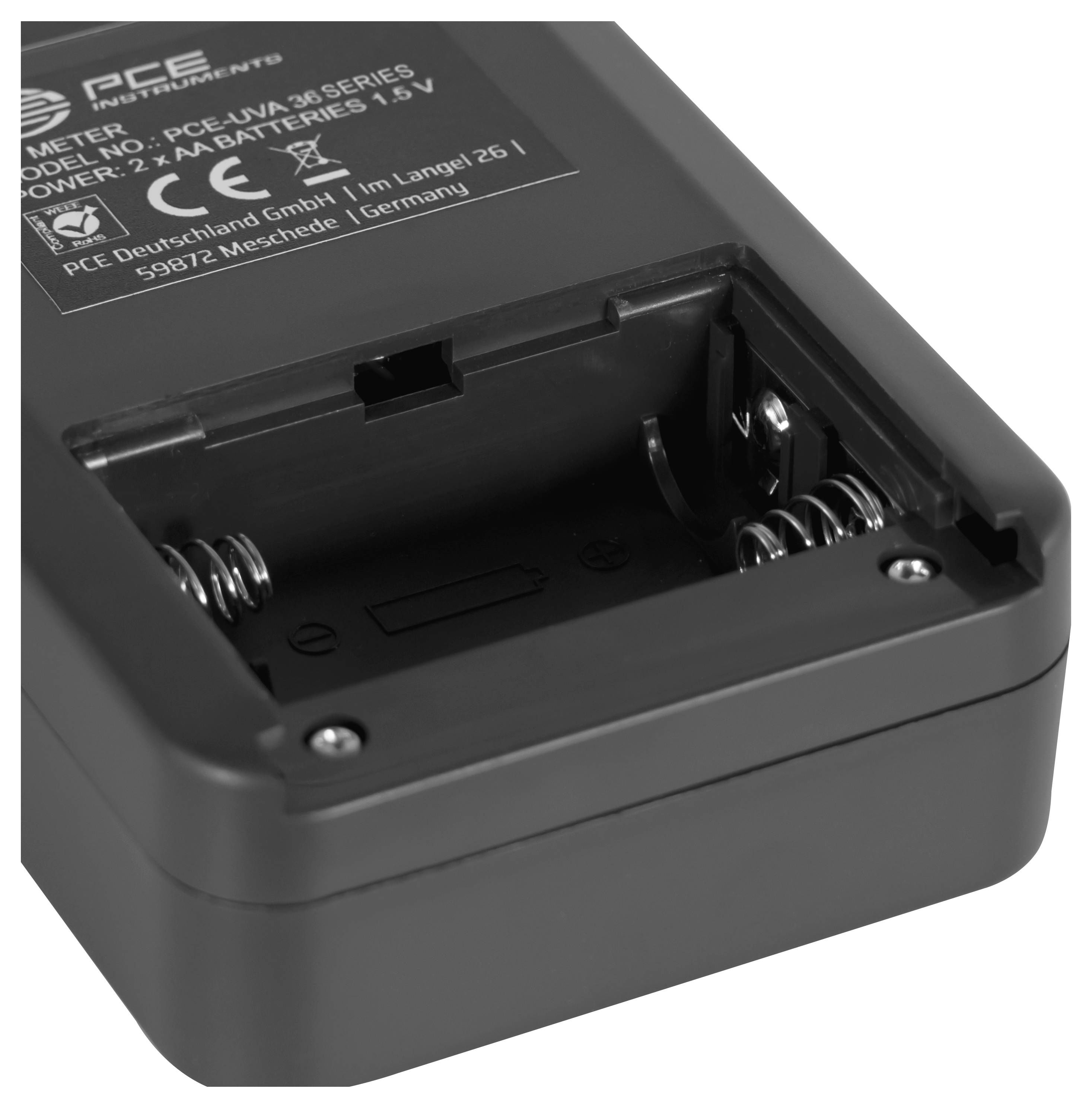 Chargeur noir ou compartiment à batteries avec ressorts pour deux piles AA et étiquette de produit imprimée sur le dessus.