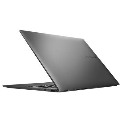 Un élégant ordinateur portable noir ouvert vu de profil, mettant en évidence son design mince et son esthétique minimaliste avec un logo discret sur le couvercle.