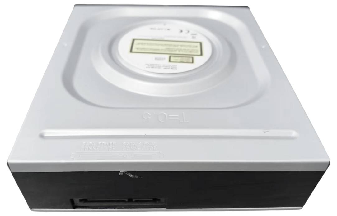 Un lecteur de disque optique en argent avec un plateau de chargement frontal, présentant un logo de disque et une étiquette de sécurité sur le dessus.