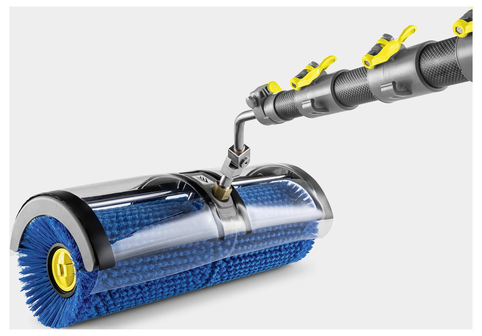 Un appareil de nettoyage avec des brosses rotatives bleues et une poignée en métal pour le nettoyage de surfaces industrielles ou très exigeantes.