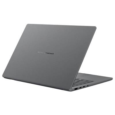Un élégant ordinateur portable fermé au design minimaliste gris, montrant la forme compacte de l'appareil et son profil léger, vu sous un angle.