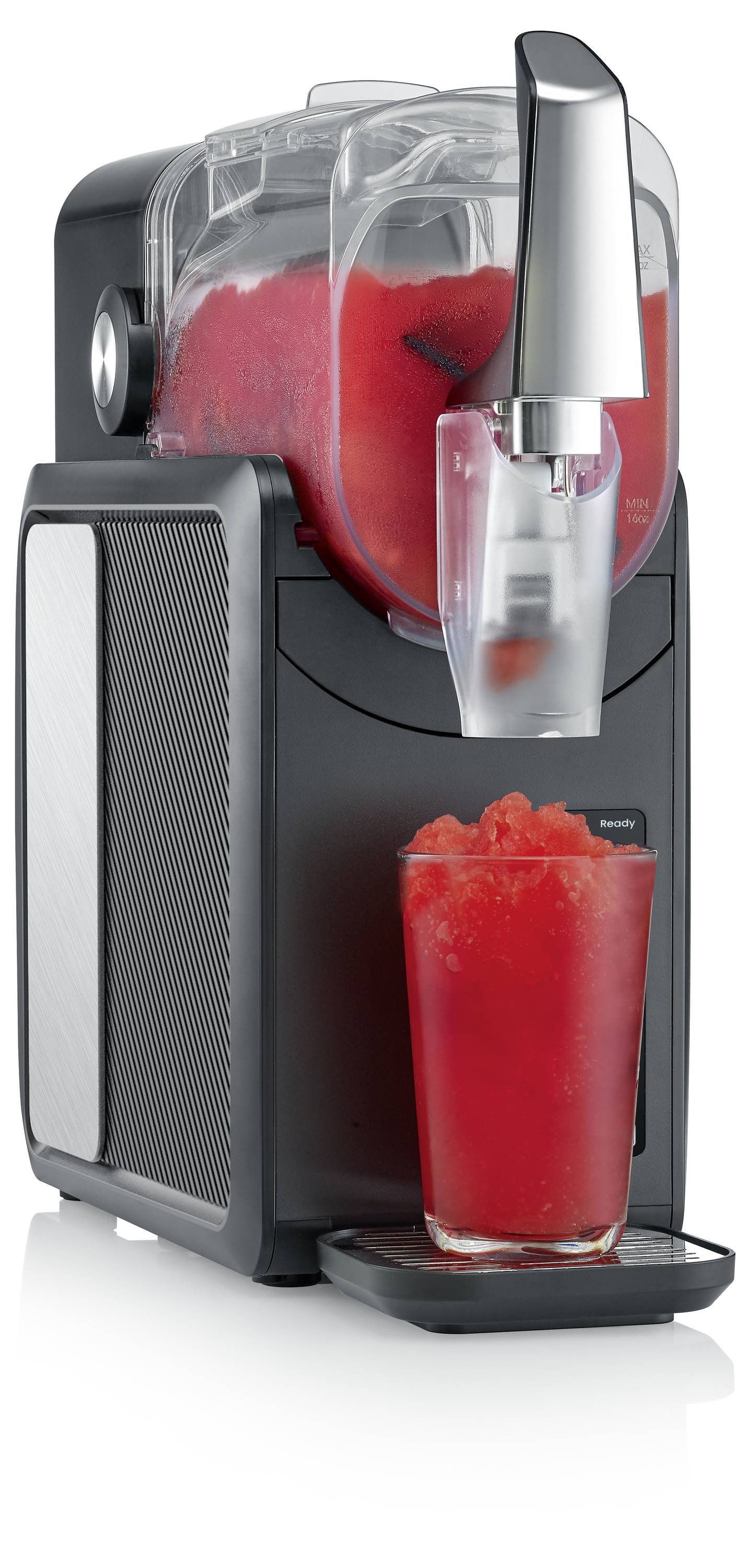 Machine à boisson glacée distribuant un slush rouge dans un verre transparent placé sur le plateau de la machine.