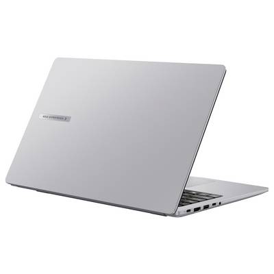 Un ordinateur portable argenté fermé avec un logo sur le couvercle arrière, placé selon un léger angle, montrant un design épuré et moderne.