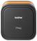 Une imprimante d'étiquettes 'Brother P-touch E920BT' noire avec un accent orange sur le bord supérieur, vue de dessus.