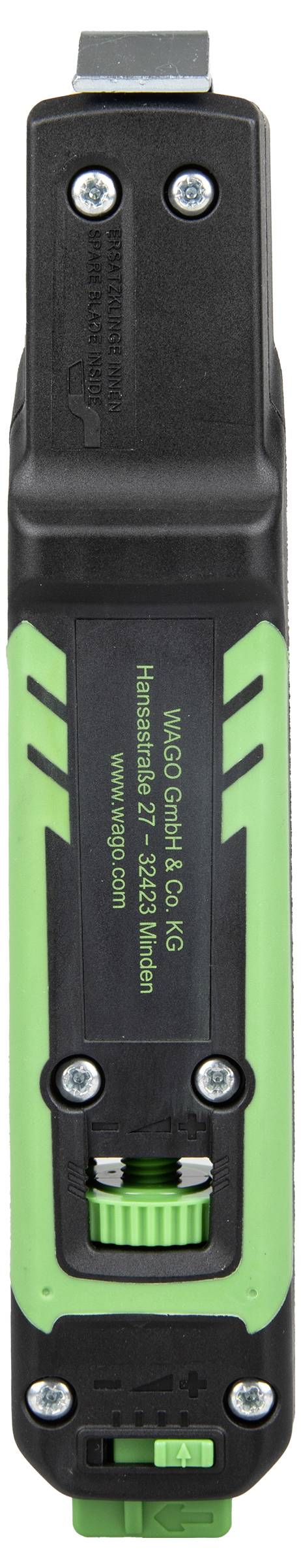 Un appareil électronique portatif vert et noir avec des boutons et des cadrans, utilisé pour la mesure ou l'étalonnage dans des applications techniques.
