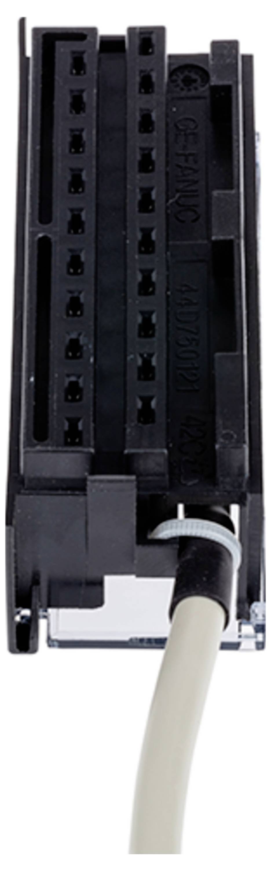 Un gros plan d'un connecteur électronique rectangulaire avec un câble beige attaché, utilisé pour le transfert de données ou d'énergie dans divers appareils.