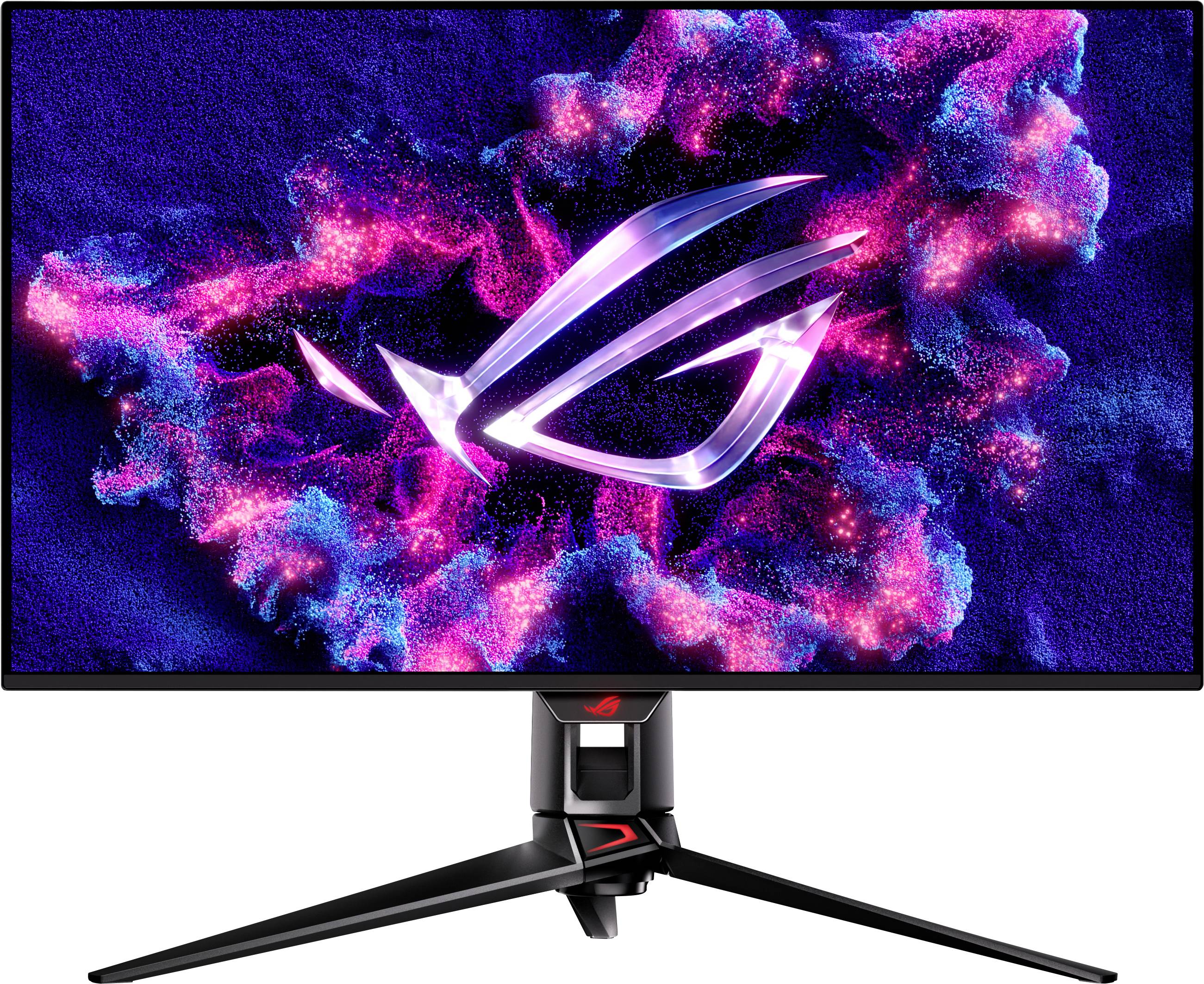 Un moniteur de jeu avec un design de nébuleuse rose et bleu vibrant sur l'écran et un logo futuriste au centre, posé sur un support de trépied élégant.