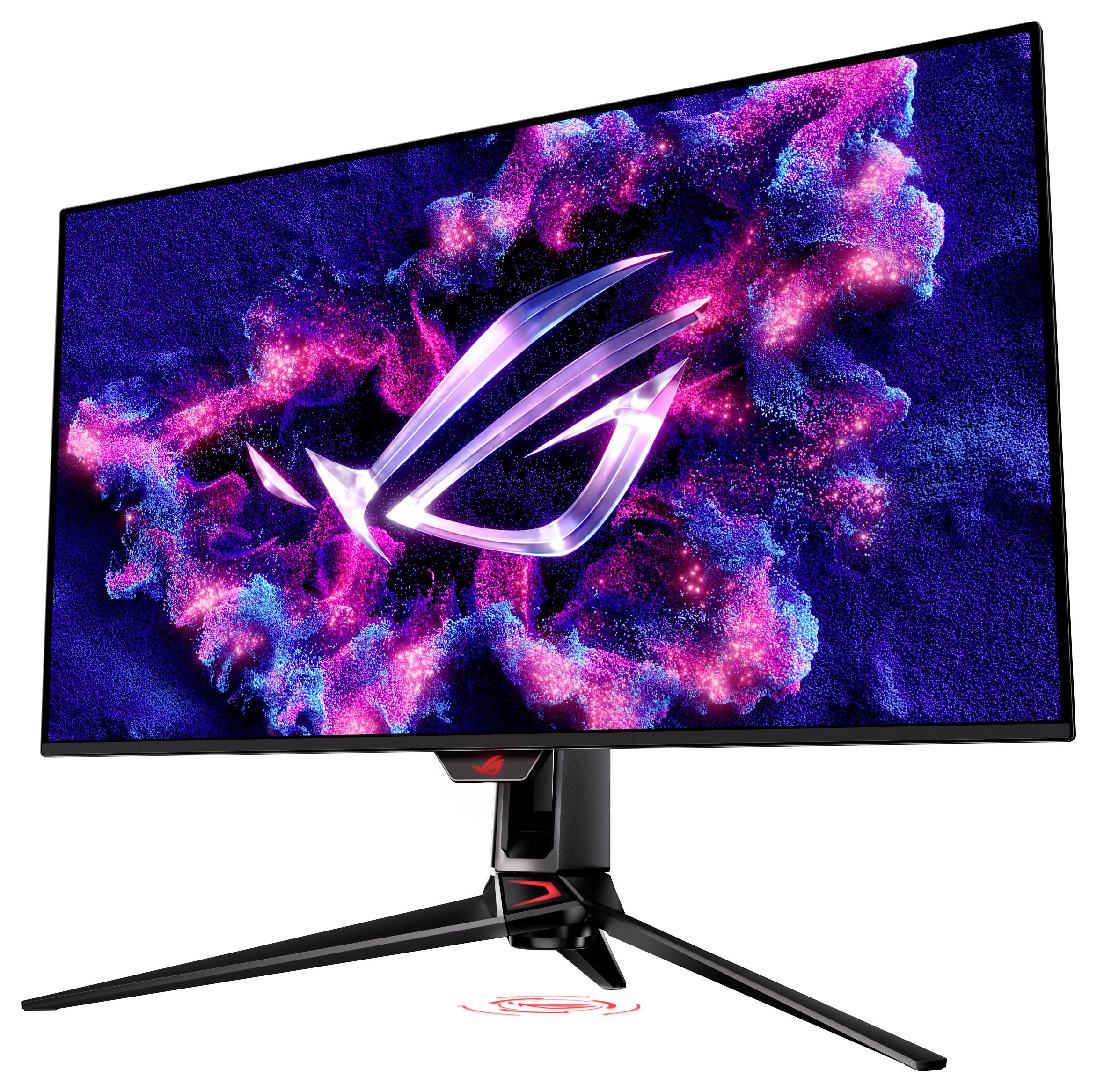 Un écran de jeu affiche un design cosmique vibrant avec un logo luminescent au centre. L'écran est élégant et moderne sur un support robuste.