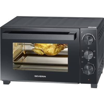 Un four de comptoir noir avec une porte vitrée, cuisant un poulet assaisonné sur une broche rotative. Des boutons sur le côté contrôlent la température et les réglages.
