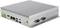 Ordinateur industriel compact avec boîtier métallique nervuré, bouton d'alimentation orienté vers l'avant, plusieurs ports USB, connexions Ethernet et ports série.