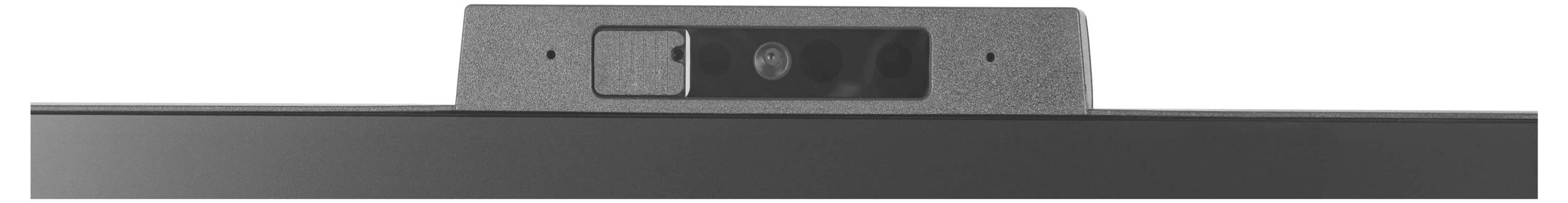 Une webcam grise positionnée sur le haut d'un moniteur noir, dotée d'une lentille au centre et d'un petit trou probablement destiné à un microphone.